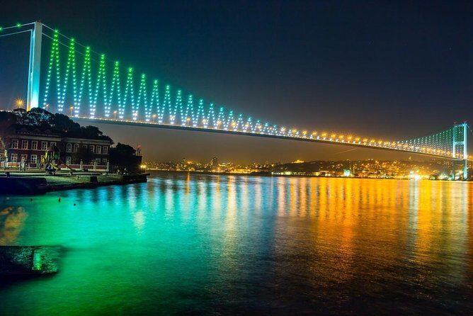 Bosphorus Dinner Cruise with Folk Dance and Live Performances - Bosphorus Bridge and Fatih Sultan Mehmet Bridge: the night geometry moment