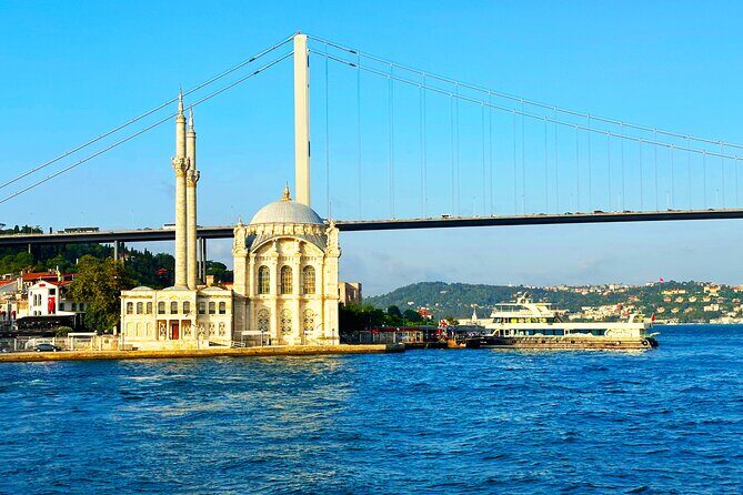 Bosphorus & Golden Horn: Sunset Yacht Cruise with Expert Guide - Rumeli Fortress, the Second Bridge, and Fortress-Over-Water Views