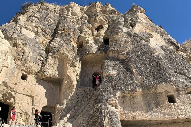 Cappadocia Red Tour with Hotel Pick-up & Drop-Off, All-Inclusive - Uçhisar Castle: highest point, cave rooms, and millstone doors