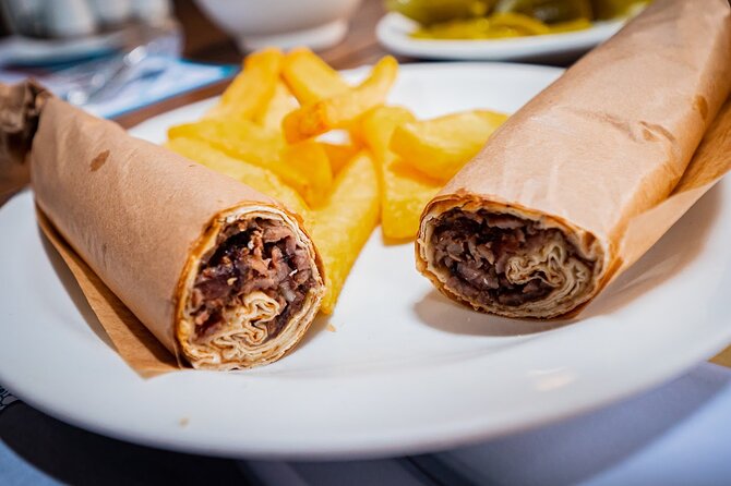 Istanbul Kadikoy Food Tour with 12+ Local Delicacies Tastings - Stop 5 on Arayıcıbaşı Sokağı: backstreets, umbrella street, and bar culture