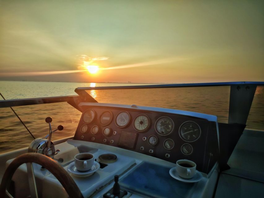 Istanbul: Sunset Yacht Cruise on the Bosphorus with Transfer - Onboard comfort: snacks, drinks, and a guide with a microphone
