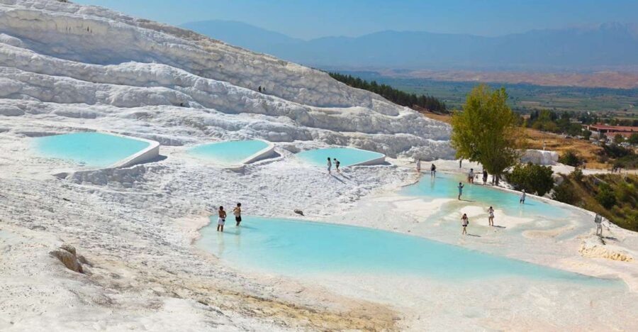 Pamukkale and Hierapolis Full-Day Guided Tour - Hierapolis Sacred City: Apollo, Domitian Gate, and the cathedral