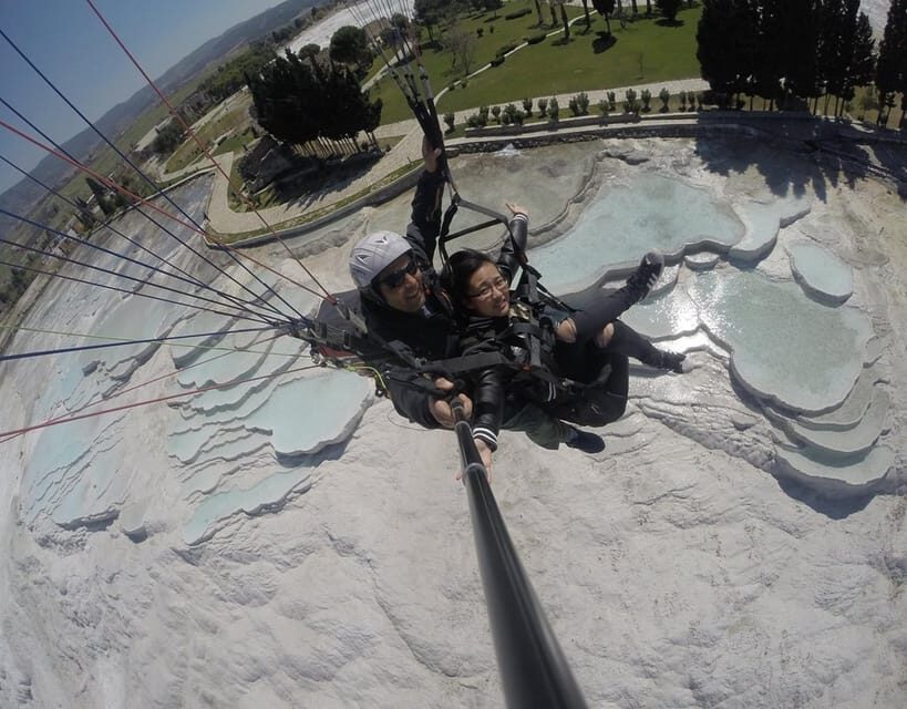 Pamukkale: Tandem Paragliding with Ancient Hierapolis Views - Tandem takeoff at Dynamite Hill: what the first minutes feel like