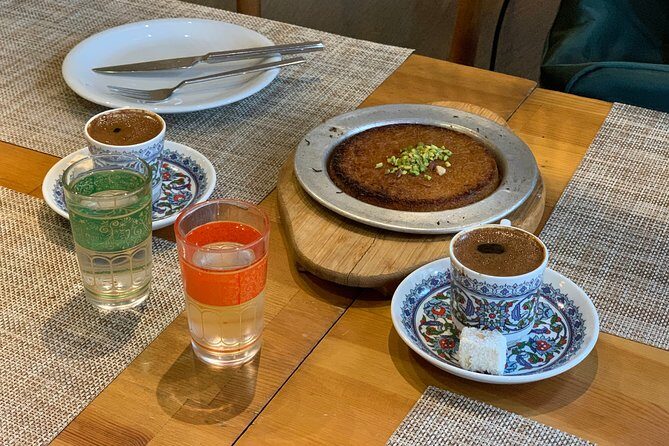 Two Continents Private and Guided Food Tour in Istanbul. - A stop for coffee and fresh baklava near Tophane Meydan Çeşmesi